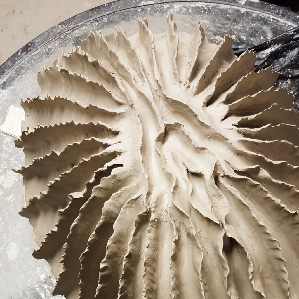 Organic clay sculpture in progress by Jenny Hoople. Click through to read about the inspiration behind her organic forms!