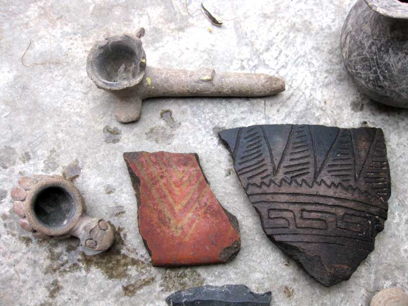 pottery-shartds-and-pipe