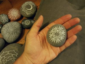 Give her a special mandala stone to keep on a windowsill. Whenever she looks at it she will think of you and come back to center. Every stone is a moment. (By Jenny Hoople of Authentic Arts, jennyhoople.com )